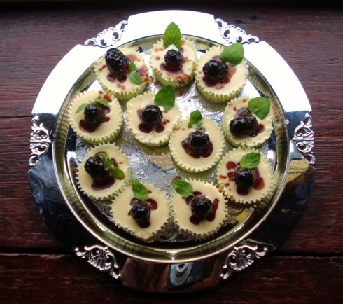 A silver platter of BerryMint mini cheesecakes.